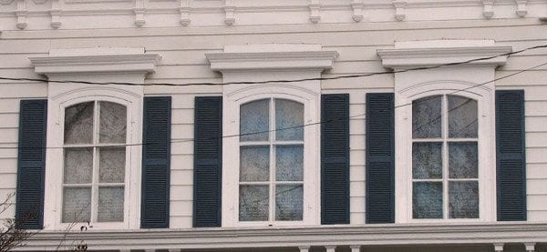 rectangular window shutters on arched italianate windows installed wrong