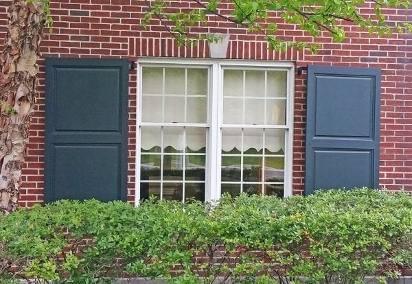 large wide green window shutters