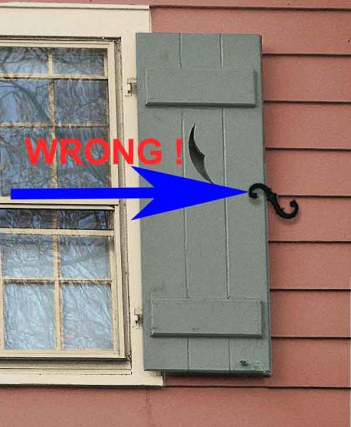 never attach a shutter dog to the side of the shutter.