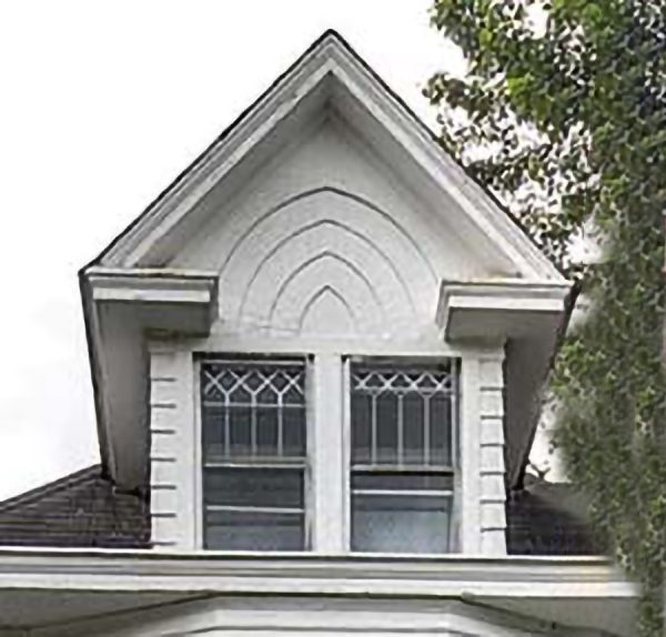 Front dormer with arched shingle pattern